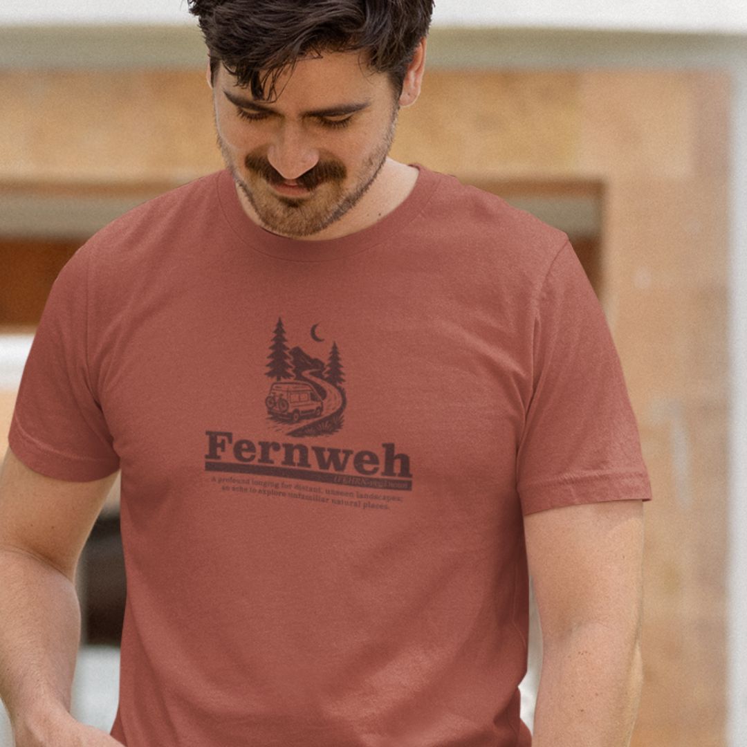 Man wearing Fernweh heather clay travel t-shirt adventure lifestyle