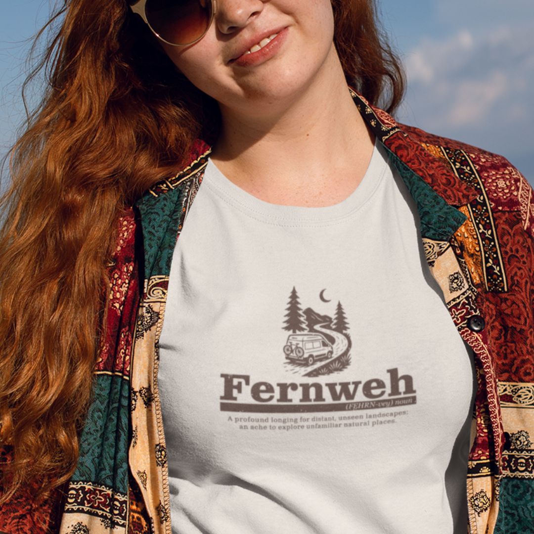 Woman wearing Fernweh natural travel t-shirt wanderlust lifestyle