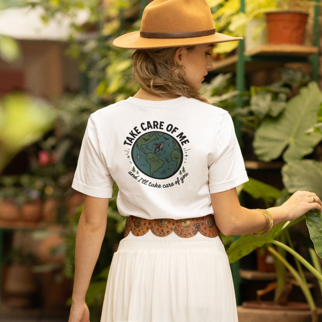 Woman wearing Take Care of Me environmental t-shirt nature lover
