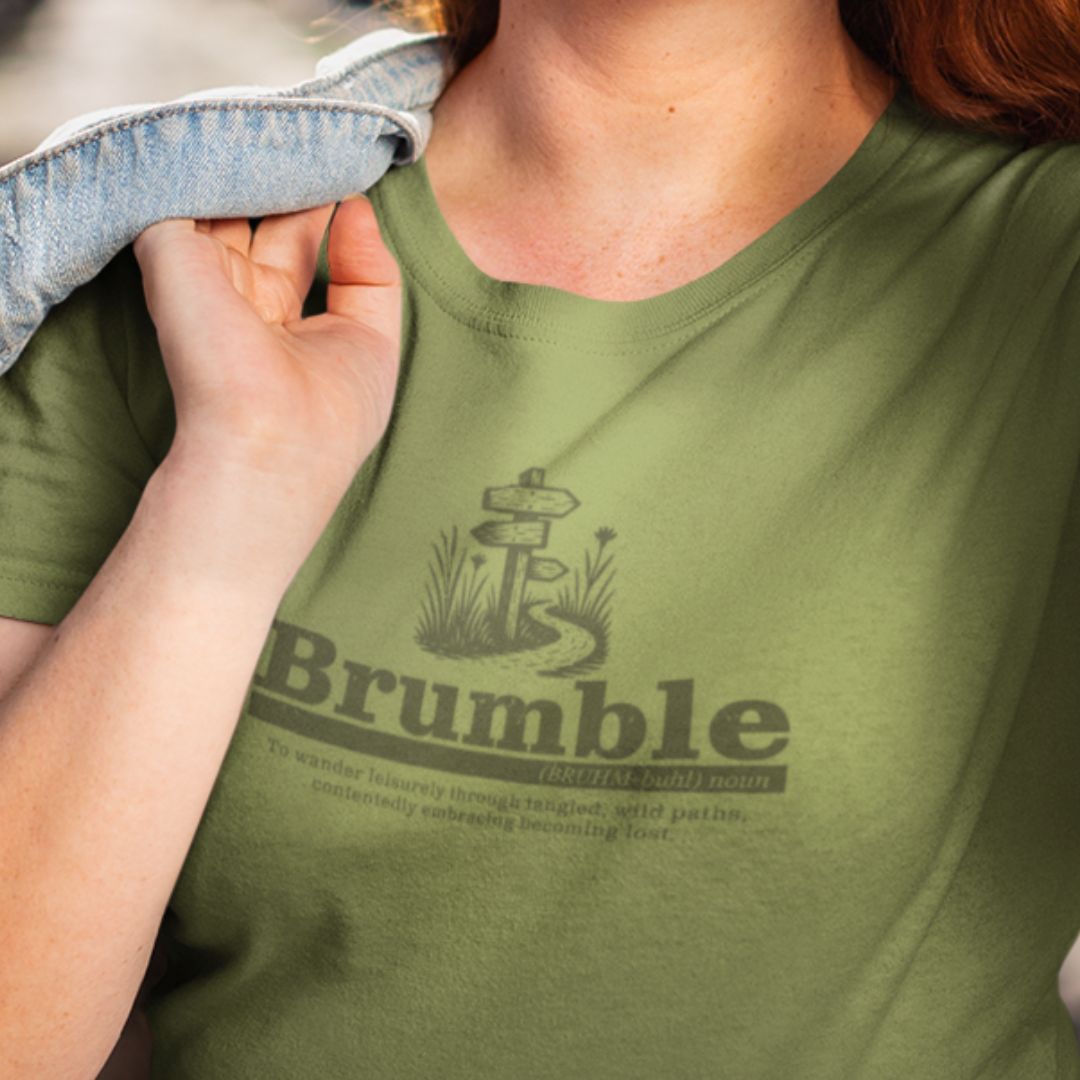 Woman wearing Brumble Wilderness olive outdoor adventure t-shirt hiking
