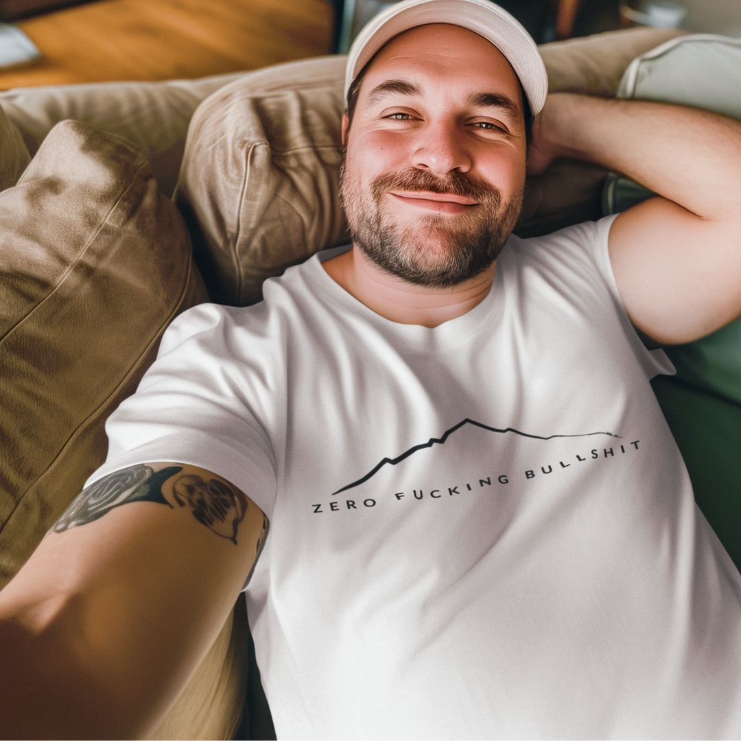 Man wearing Mountains Have Zero BS outdoor t-shirt lifestyle photo

