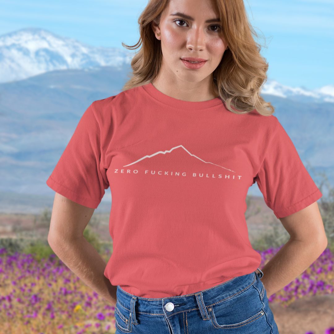 Woman wearing Mountains Have Zero BS outdoor tee heather red lifestyle
