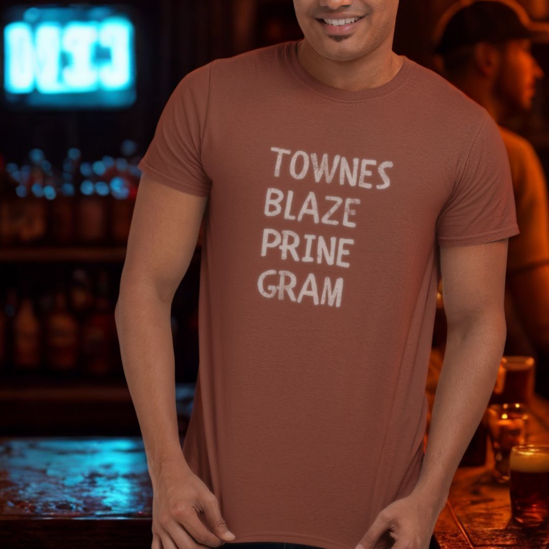 Man wearing a brown t-shirt with text in a bar setting