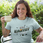 Woman wearing Talk Earthy to Me funny outdoor t-shirt camping humor

