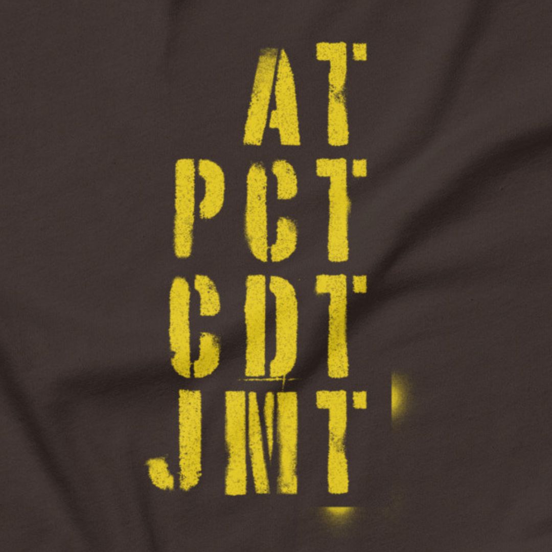 Trail Legends thru hiking t-shirt brown AT PCT CDT JMT close-up
