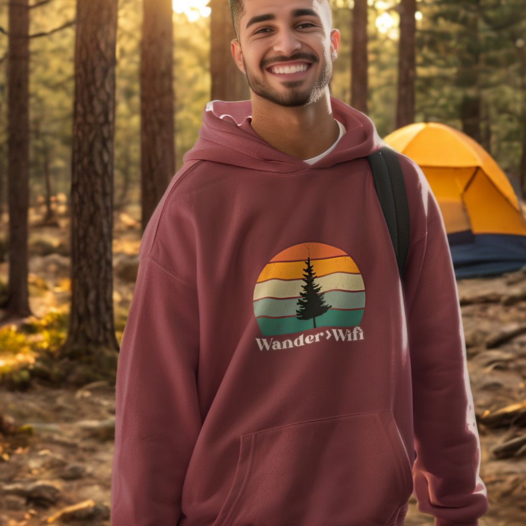 Man wearing Wander is Greater than Wifi maroon hoodie outdoor lifestyle
