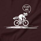 On Your Left Raccoon cycling t-shirt oxblood close-up funny bike design
